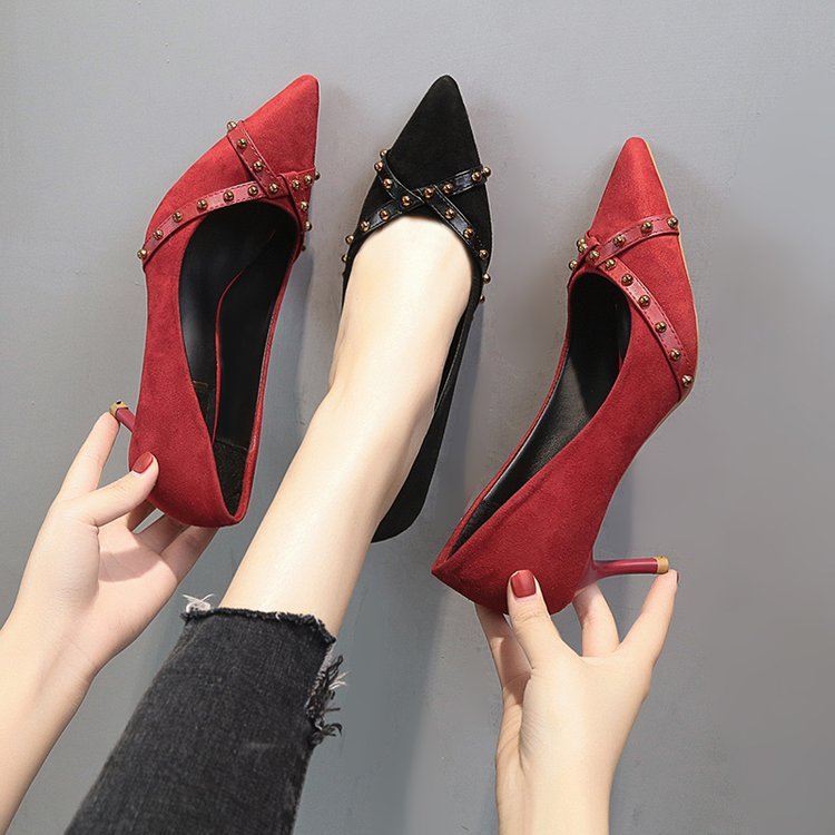 Pointed rivet high heels